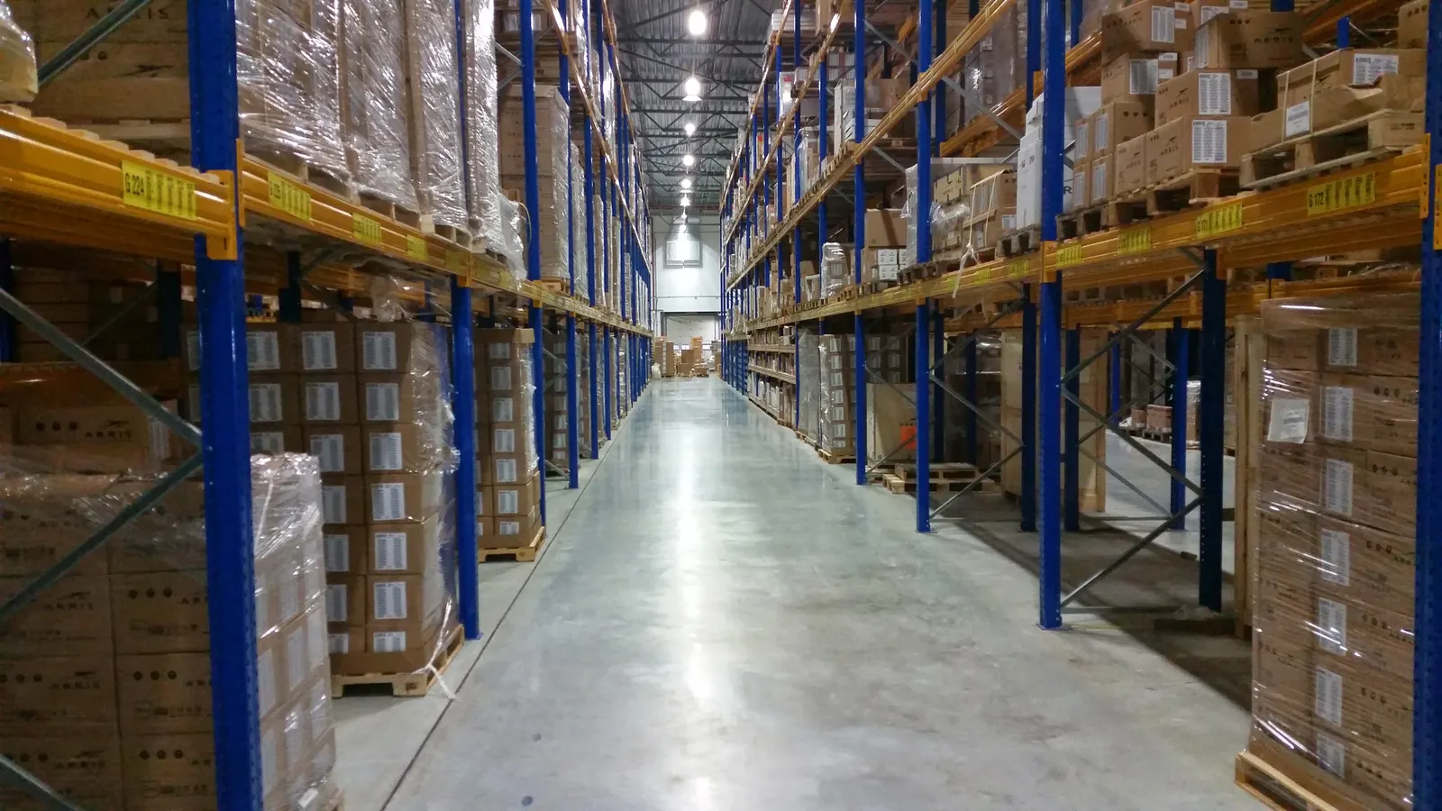 Illustrative stock photo: Packaged goods organized in a warehouse